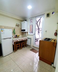 Kuchyň nebo kuchyňský kout v ubytování Sunhome Stepanavan Guest House