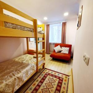 Postel nebo postele na pokoji v ubytování Sunhome Stepanavan Guest House