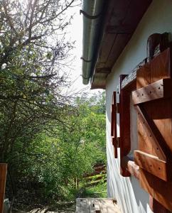 a view from the outside of a house with trees at Nature Lodge Csesztve in Csesztve