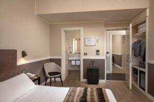 Postel nebo postele na pokoji v ubytování Fragrance Hotel St. Peter