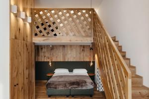 Voodi või voodid majutusasutuse Hotel Pradat toas