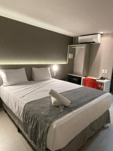 Postel nebo postele na pokoji v ubytování Saint Patrick Grand Hotel