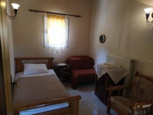 Postel nebo postele na pokoji v ubytování Plataniotissa Mansion
