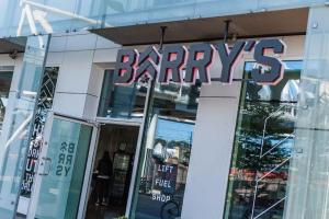 a barneys store with a sign on the front of it at Spacious modern 2BR apartment at Central OSLO BARCODE in Oslo