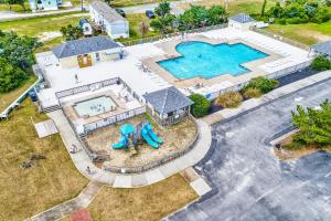 an overhead view of a house with a swimming pool at AVHC41 Outrigger Cottage on Hatteras Island in Avon