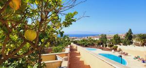 a view from the balcony of a resort at Costa Adeje Holiday Home in Adeje