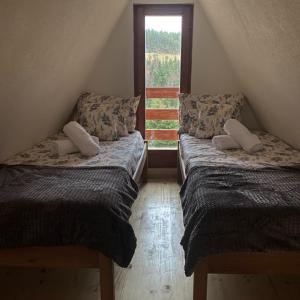 Postel nebo postele na pokoji v ubytování The Tara Concept