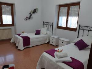 Un pat sau paturi într-o cameră la Casa Rural-Casa Murgui