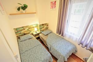 A bed or beds in a room at Plaza Polvorista 4-Bedroom Apartment w Balcony
