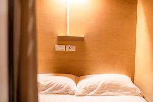Letto o letti in una camera di The Dorm Hostel