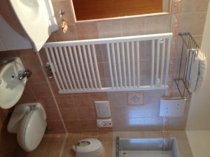 Koupelna v ubytování Albergo Centrale
