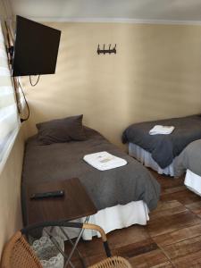 Postel nebo postele na pokoji v ubytování Hotel Restaurante Aconcagua