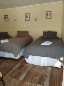 Postel nebo postele na pokoji v ubytování Hotel Restaurante Aconcagua