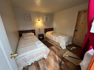 Postel nebo postele na pokoji v ubytování Hotel Restaurante Aconcagua