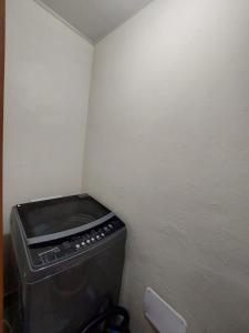 a corner of a room with a trash can at Residence Vibe Dominicus 308 in Bayahibe