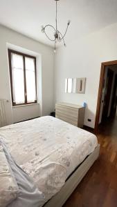 Postel nebo postele na pokoji v ubytování La Corte Barnaba
