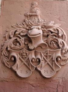 a decoration on the side of a building at Maison Kobold XVIè siècle in Wissembourg