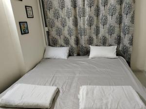 Ένα ή περισσότερα κρεβάτια σε δωμάτιο στο Rio de Amora