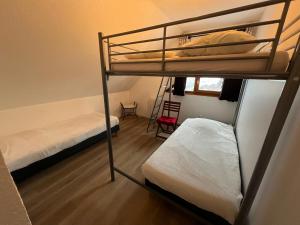 Posteľ alebo postele v izbe v ubytovaní Duplex 12p St Sorlin D'arves résidence Odalys
