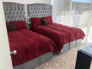 Ένα ή περισσότερα κρεβάτια σε δωμάτιο στο Penthouse Armando's Le Club +9 φωτογραφίες