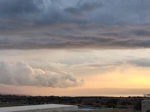 a view of a cloudy sky at sunset at נוגה בגולן in Qasrîne