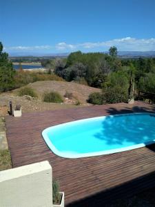 The swimming pool at or close to Condominio Monte Molinos - dpto en Nautico, 2 dormitorios y vista al lago