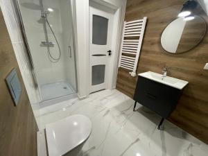 Baðherbergi á Apartamenty Wisła Centrum