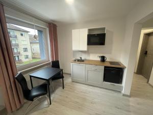 Eldhús eða eldhúskrókur á Apartamenty Wisła Centrum