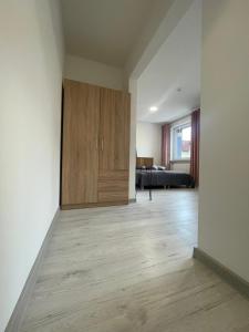 Rúm í herbergi á Apartamenty Wisła Centrum