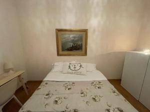 Postel nebo postele na pokoji v ubytování Paradise Rooms - Brignole Station