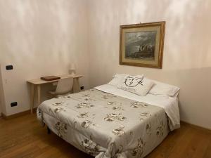 Postel nebo postele na pokoji v ubytování Paradise Rooms - Brignole Station