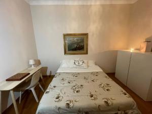 Postel nebo postele na pokoji v ubytování Paradise Rooms - Brignole Station