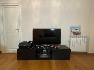 TV a/nebo společenská místnost v ubytování Paradise Rooms - Brignole Station
