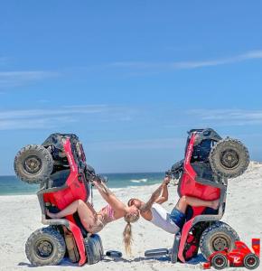 a woman on the beach with two wheelers at Região dos Lagos Casa de Campo in São Pedro da Aldeia
