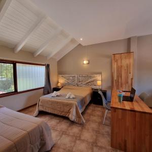 Postel nebo postele na pokoji v ubytování Apartamentos Andrea