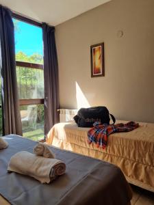 Postel nebo postele na pokoji v ubytování Apartamentos Andrea