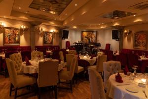 Restaurant ou autre lieu de restauration dans l'établissement Art Palace Suites & Spa
