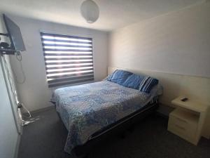 Postel nebo postele na pokoji v ubytování Casa arriendo diario para 4 personas