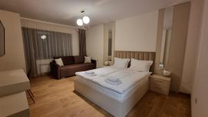 Postel nebo postele na pokoji v ubytování Guest House Gogemi