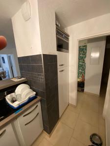 Kuchyňa alebo kuchynka v ubytovaní Appartement Cap d Agde Magnifique vue mer