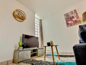 Televízia a/alebo spoločenská miestnosť v ubytovaní Superbe Type 2 - Cosy et Chaleureux