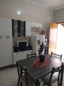 A cozinha ou cozinha compacta de Casa De Temporada Seja Bem Vindos