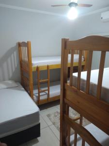 Cama ou camas em um quarto em Casa De Temporada Seja Bem Vindos