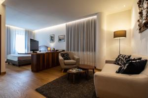 Posezení v ubytování Grand Hotel Gortani + 37 fotografií