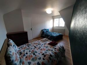 Posteľ alebo postele v izbe v ubytovaní Centre ville Concarneau T4