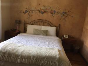Postel nebo postele na pokoji v ubytování Hotel Ines Maria
