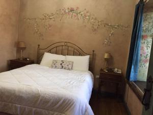 Postel nebo postele na pokoji v ubytování Hotel Ines Maria