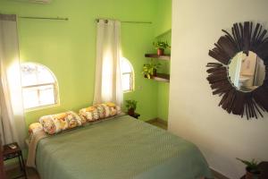 Voodi või voodid majutusasutuse Hostel La Botella de Leche - Tamarindo toas