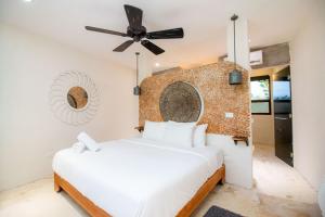 Postel nebo postele na pokoji v ubytování Spirit Holbox + 37 fotografií
