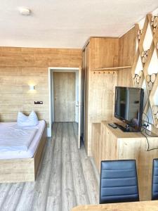 Letto o letti in una camera di Apartmány Almberg